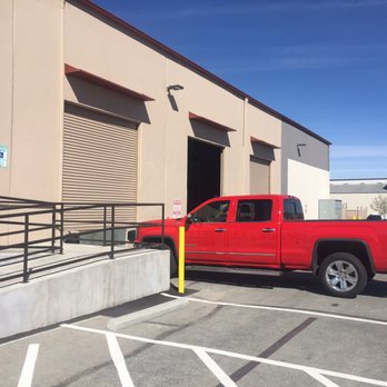 Revision Brewing - Warehouse doors open to keep the temp nice inside. - Breweries Near Me - Sparks, Nevada Revision Brewing - Warehouse doors open to keep the temp nice inside. - Breweries Near Me - Sparks, Nevada
