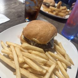 One Fourteen Bar & Grille - Mushroom and Swiss hamburger with fries.