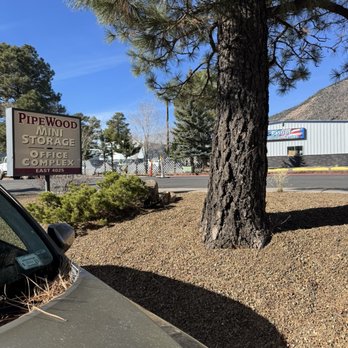 Pipewood Office Complex & Mini Storage - Small pipe wood storage sign. Find them across from Patriot collusion - Self Storage Near Me - Flagstaff, Arizona Pipewood Office Complex & Mini Storage - Small pipe wood storage sign. Find them across from Patriot collusion - Self Storage Near Me - Flagstaff, Arizona