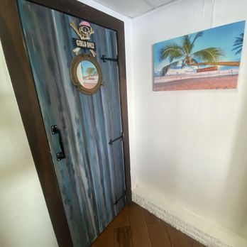 Riviera Bar and Grill - Love this restroom door - Bars Near Me - Punta Gorda, Florida