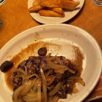 Texas Roadhouse - Ribeye w/ onions & mushrooms with a French fry side - Barbeque Near Me - Anchorage, Alaska