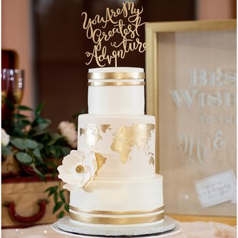 Imaginary Cakes - a white wedding cake with gold accents - Cupcakes Near Me - Wilmington, North Carolina