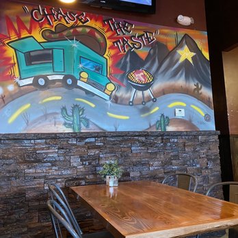 Chase the Taste - Wall art in the restaurant. - New American Near Me - El Paso, Texas