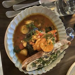 Bouillabaisse loaded with seafood. So good!