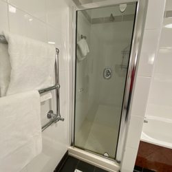 Park House Hotel - The shower is only about 2 feet wide. Looks much bigger in this picture. My husband is 6'4" and 230 and will not fit in this thing