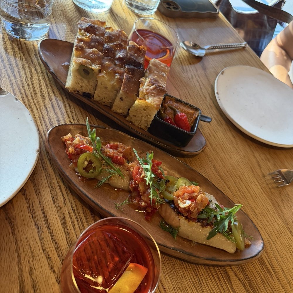 Carrello - House made focaccia, seared salmon belly, mezcal Negroni - Italian Near Me - Seattle, Washington