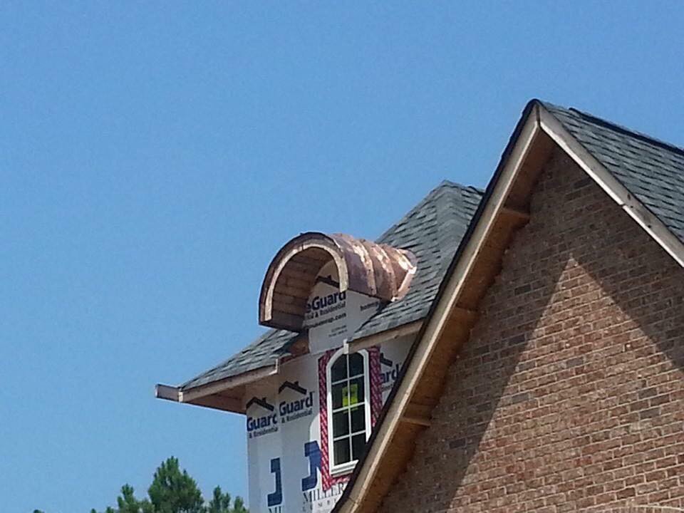 Slide of Patch Adams Roofing