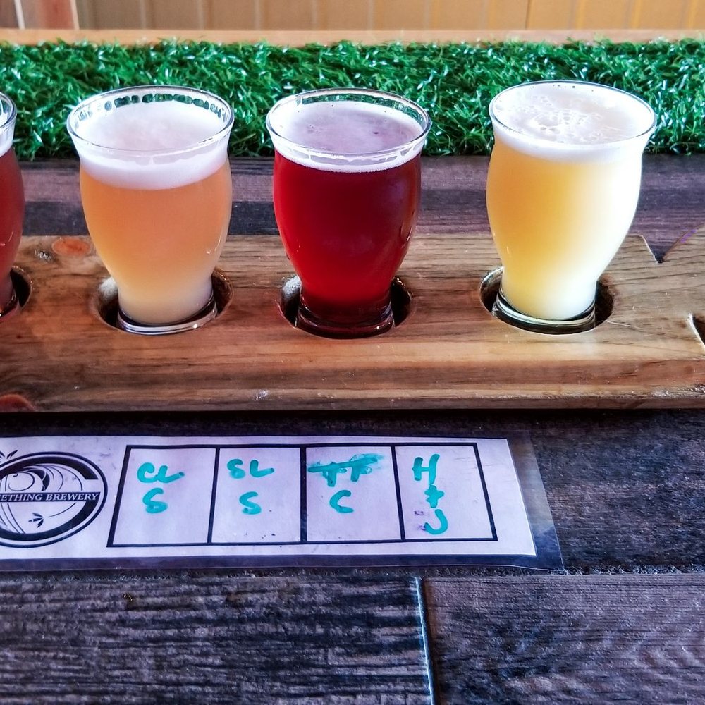 Something Brewery - Beer flight numero uno: Cherry Limeade Slush, Strawberry Limeade Slush, Triple Threat Slush, and Haze & Juice. - Breweries Near Me - Brighton, Colorado Something Brewery - Beer flight numero uno: Cherry Limeade Slush, Strawberry Limeade Slush, Triple Threat Slush, and Haze & Juice. - Breweries Near Me - Brighton, Colorado