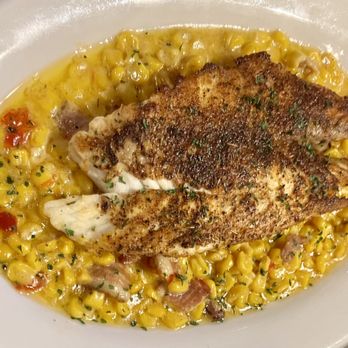 Seville Quarter - Blackened Red Fish Blackened Red Fish over Roasted Corn Maque Choux - New American Near Me - Pensacola, Florida