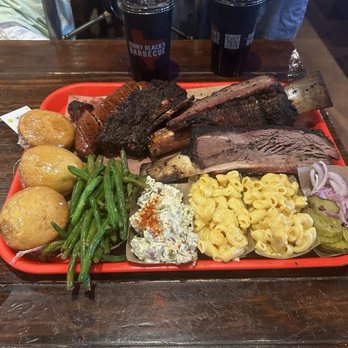 Terry Black's Barbecue - Cornbread, green beans, potato salad, Mac and cheese, sausage, brisket, and beef ribs - Barbeque Near Me - Austin, Texas Terry Black's Barbecue - Cornbread, green beans, potato salad, Mac and cheese, sausage, brisket, and beef ribs - Barbeque Near Me - Austin, Texas