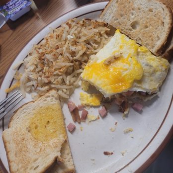 Tangie's Cafe - Meat lovers omelet with hashbrowns and sourdough toast. - Cafes Near Me - American Fork, Utah