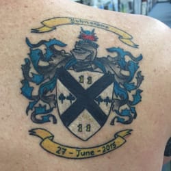 Soular Tattoo - This is my coat of arms with the date we got married on inscribed on the banner.