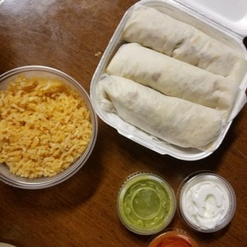 Rose's Taco Grill - 2 Carnita Tacos and 1 Spicy Pork tacos. Salsa, hot sauce and sour cream with a side of rice. - Mexican Near Me - Riverdale, Georgia Rose's Taco Grill - 2 Carnita Tacos and 1 Spicy Pork tacos. Salsa, hot sauce and sour cream with a side of rice. - Mexican Near Me - Riverdale, Georgia