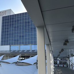 Short easy walk across the bridge from (validated) parking to the terminal / hotel escalator up to Grand Met.