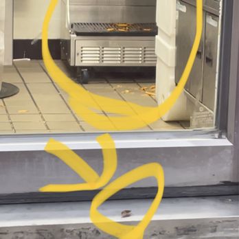 Checkers - a view of a kitchen through a window - Burgers Near Me - Daytona Beach, Florida Checkers - a view of a kitchen through a window - Burgers Near Me - Daytona Beach, Florida
