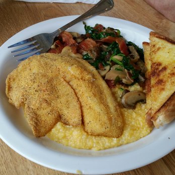 Huskers Cafe - Huge portion of perfectly cooked talapia, with bacon and sausage. And still not too salty. Grits are toothy. Yum. - Breakfast & Brunch Near Me - Stone Mountain, Georgia Huskers Cafe - Huge portion of perfectly cooked talapia, with bacon and sausage. And still not too salty. Grits are toothy. Yum. - Breakfast & Brunch Near Me - Stone Mountain, Georgia