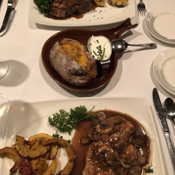 Bob Heilman's Beachcomber - Giant Veal Chop with loaded baked potato and squash Chicken Marsala and squash - Seafood Near Me - Clearwater Beach, Florida