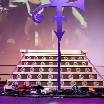 Paisley Park - One huge auditorium is filled with outfits, his car, motorcycle, and a stage which plays videos to give the feeling of being at a concert. - Art Museums Near Me - Chanhassen, Minnesota Paisley Park - One huge auditorium is filled with outfits, his car, motorcycle, and a stage which plays videos to give the feeling of being at a concert. - Art Museums Near Me - Chanhassen, Minnesota