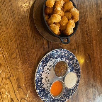 South Kitchen + Bar - Appetizer tots with sauces - Cocktail Bars Near Me - Athens, Georgia South Kitchen + Bar - Appetizer tots with sauces - Cocktail Bars Near Me - Athens, Georgia
