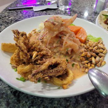 The Flaming Llama - Chiveche burro. Fried octopus, sweet potato, and marinated fish - Peruvian Near Me - Hartford, Connecticut The Flaming Llama - Chiveche burro. Fried octopus, sweet potato, and marinated fish - Peruvian Near Me - Hartford, Connecticut
