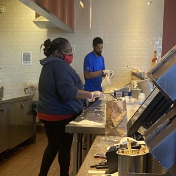QDOBA Mexican Eats - Filthy food prep surface. One employee with no mask; another with it under her nose. - Mexican Near Me - Jonesboro, Arkansas
