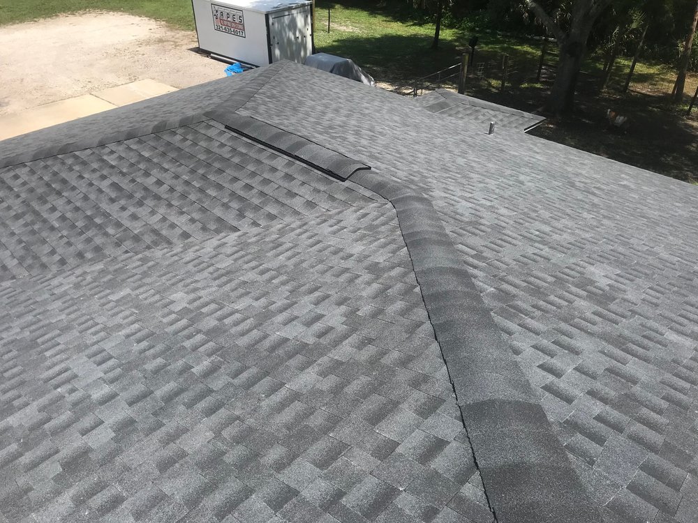 Slide of Veritas Roofers