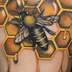 Topnotch Tattoo - The bee I took them that looks nothing like the awful job they did