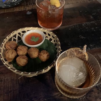 Wayla - Moo Sarong - Pork Meatballs + Spiked Thai Iced Tea (top) + Waking Up In Kodawari (bottom) - Thai Near Me - New York, New York Wayla - Moo Sarong - Pork Meatballs + Spiked Thai Iced Tea (top) + Waking Up In Kodawari (bottom) - Thai Near Me - New York, New York