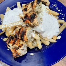 Greek Fries with Chicken. I think they are called Athena Fries Greek Fries with Chicken. I think they are called Athena Fries