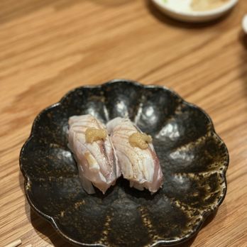 Hatsuyuki Handroll Bar - Shima aji (with garlic puree) - Sushi Bars Near Me - Frisco, Texas Hatsuyuki Handroll Bar - Shima aji (with garlic puree) - Sushi Bars Near Me - Frisco, Texas
