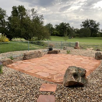 Quality Control Hardscapes - a gravel patio with rocks and a fence - Landscaping Near Me - Commerce City, Colorado Quality Control Hardscapes - a gravel patio with rocks and a fence - Landscaping Near Me - Commerce City, Colorado