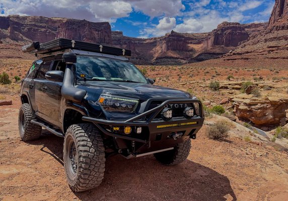 Toyota 4Runner - We take the gold standard to a whole new level!
4Runner has been conquering overlanding for more than 35 years, and ours is no exception. Fully tricked out with 3-way adjustable lift kit, enough Baja Designs LED lighting to light a small city, snorkel, and so much more (see our accessory list below.) This is the overland vehicle that all others aspire to. Loaded for excellent adventures! Toyota 4Runner - We take the gold standard to a whole new level!
4Runner has been conquering overlanding for more than 35 years, and ours is no exception. Fully tricked out with 3-way adjustable lift kit, enough Baja Designs LED lighting to light a small city, snorkel, and so much more (see our accessory list below.) This is the overland vehicle that all others aspire to. Loaded for excellent adventures!