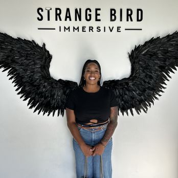 Strange Bird Immersive - Pic opt in front lobby. They have a selfie setup to capture your whole group. - Escape Games Near Me - Houston, Texas Strange Bird Immersive - Pic opt in front lobby. They have a selfie setup to capture your whole group. - Escape Games Near Me - Houston, Texas