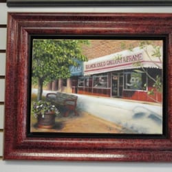 Black Gold Gallery & Frame - This is an original oil painting of the store front. We floated the canvas, and then topped it with a 2nd frame to reflect th...