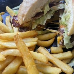 Joe's Cafe - Joes All American Burger Combo added bacon & cheddar delicious! just look at that cheese!