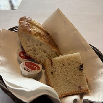 Sagamité - Complementary bread (right side is traditional with currants(?)) - Canadian (New) Near Me - Quebec City, Quebec Sagamité - Complementary bread (right side is traditional with currants(?)) - Canadian (New) Near Me - Quebec City, Quebec