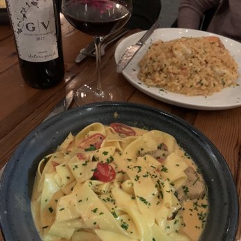 Grand Vin - Pappardelle (front) and shrimp risotto (back). Huge portions! - Wine Bars Near Me - Hoboken, New Jersey