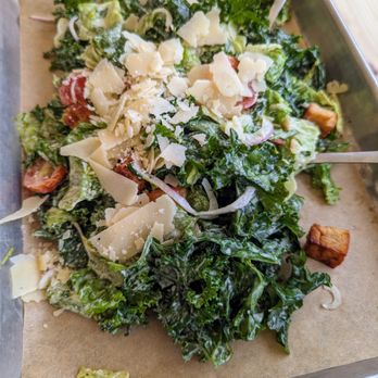 Franklin Motors - Caesar Salad. $10. Mix of romaine and kale, red onion, tomatoes, croutons, shaved Parmesan, housemade Caesar dressing. - Beer Gardens Near Me - Chapel Hill, North Carolina