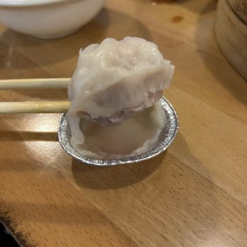 Dillon's Dumpling House - Example of how they all stuck to the tin - we eat soup dumplings regularly at other spots that do not have this problem - Dim Sum Near Me - Aurora, Colorado