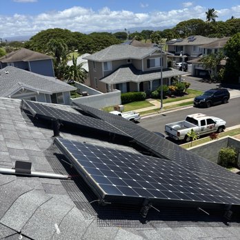 Pressure Pros - Second story solar panels being bird proofed - Solar Panel Cleaning Near Me