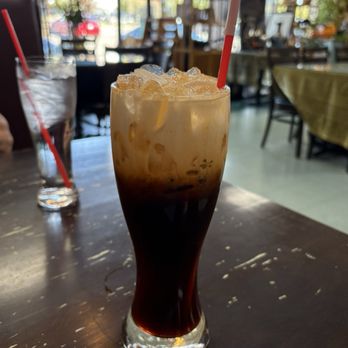Thai Orchid - Thai iced tea before stirring - Thai Near Me - Yukon, Oklahoma Thai Orchid - Thai iced tea before stirring - Thai Near Me - Yukon, Oklahoma