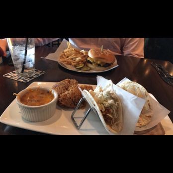 Yard House - Chicken tinga tacos with rice and beans/ BBQ bacon burger with fries - Bars Near Me - Dedham, Massachusetts Yard House - Chicken tinga tacos with rice and beans/ BBQ bacon burger with fries - Bars Near Me - Dedham, Massachusetts
