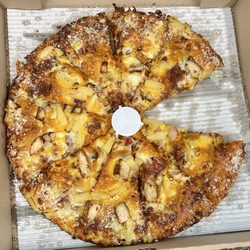 Mike's Pizza & More - A Hawaian type of pizza with pineapple and meat
