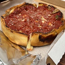 a deep dish pizza in a box a deep dish pizza in a box