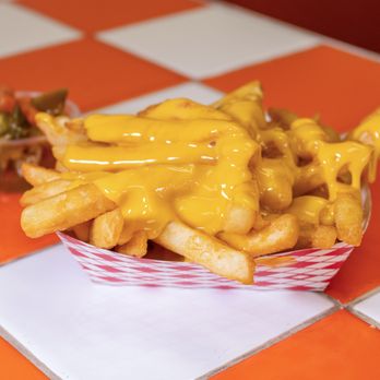 Pappa Geno's - Cheese fries with a side of hot peppers - Sandwiches Near Me - Houston, Texas Pappa Geno's - Cheese fries with a side of hot peppers - Sandwiches Near Me - Houston, Texas