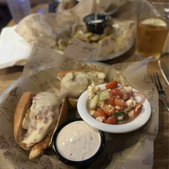 Kickin' Chicken - Mt Pleasant - Original Kickin' Chicken Sandwich with tomato cucumber salad - Bars Near Me - Mt. Pleasant, South Carolina Kickin' Chicken - Mt Pleasant - Original Kickin' Chicken Sandwich with tomato cucumber salad - Bars Near Me - Mt. Pleasant, South Carolina