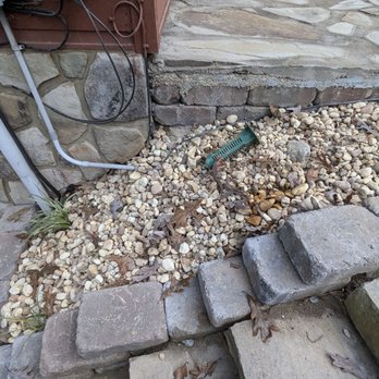 Sanfords Landscaping & Renovation - This is egg rock that was just dumped over whatever was there. Termite traps were supposed to be put back in before the rock filled. - Decks & Railing Near Me - Chatsworth, Georgia Sanfords Landscaping & Renovation - This is egg rock that was just dumped over whatever was there. Termite traps were supposed to be put back in before the rock filled. - Decks & Railing Near Me - Chatsworth, Georgia