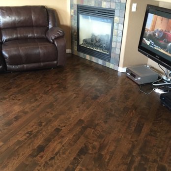 Hi-Altitude Flooring - a living room with a fireplace - Flooring Near Me Hi-Altitude Flooring - a living room with a fireplace - Flooring Near Me