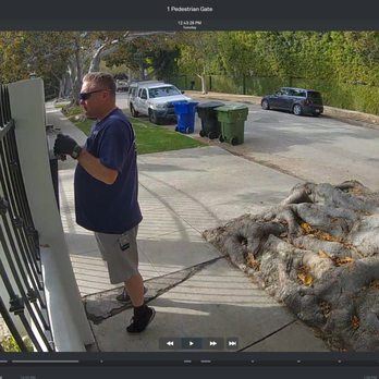 Rick's Gate Works - Using a master key to open the box outside without permission - Garage Door Services Near Me - Canoga Park, California