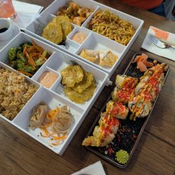 Candela Asian Food - A couple of bento boxes and sushi rolls.
